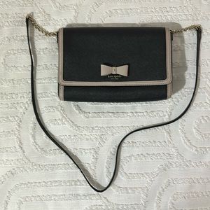 Kate Spade Crossbody! Black with beige trim and center bow! Small stains.